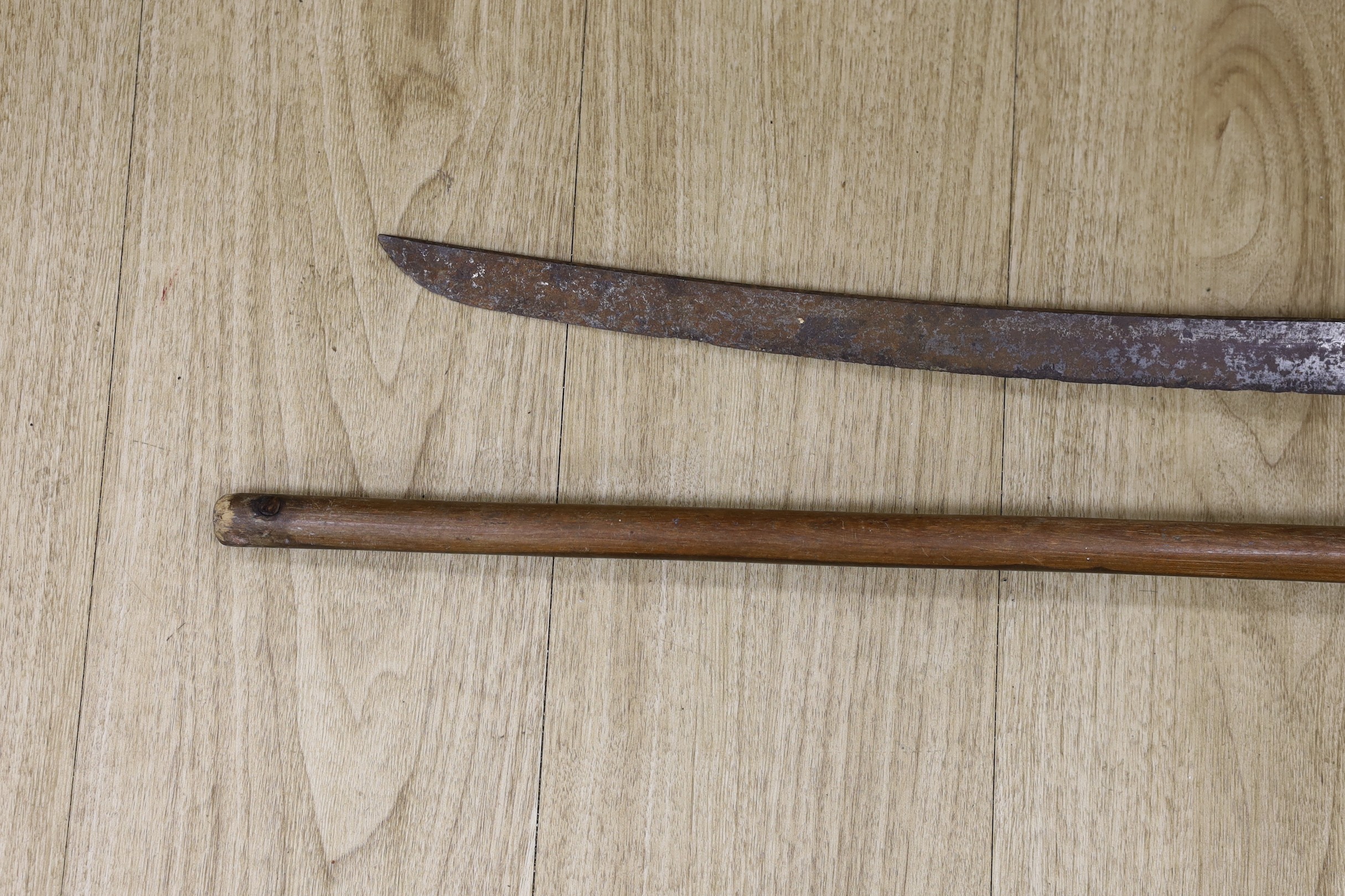 A Japanese wakizashi (corroded) with signed tang and a South African ebony knobkerrie, 80cm long